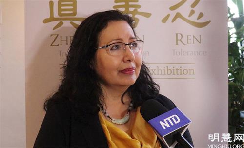 '图8:退休经济学大学教授Lydia Ortega说了解法轮功美好'