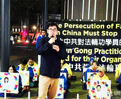 '图4:中国人权倡导者理查德·吕(Richard Lue)在集会上发言'