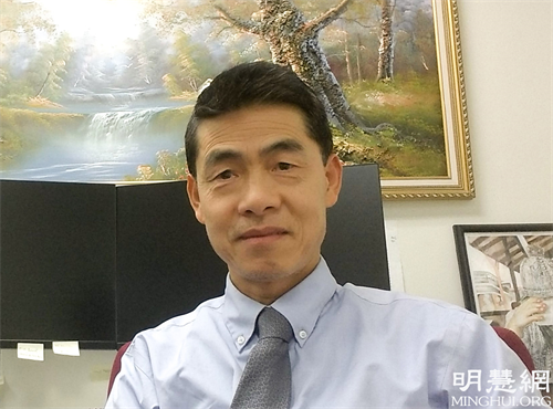 图:在政府工作的资深精算师林明亮先生