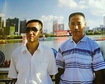 '李德祥(左)、李德全'
