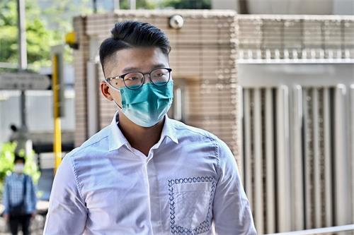 '图3:法轮功学员廖秋兰二零一九年就十一游行与警方开会后,遭暴徒袭击。三名被告柯衍湛、陈嘉明及王述杰被控“有意图伤人罪”。图为王述杰。'