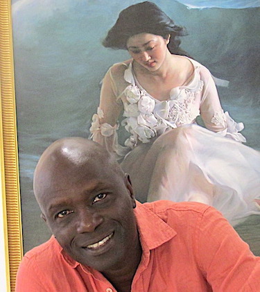 图4:音乐家帕普-恩迪亚耶-阿马特(Pape N’Diaye Amath)感谢画展传递法轮功的信息