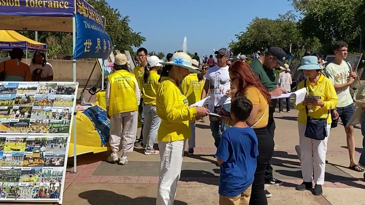 图6:民众签名支持法轮功反迫害。