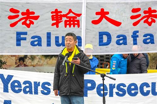'图9:二零二二年七月九日,墨尔本民运联盟监事长高健先生在墨尔本“七二零反迫害集会”上发言。'
