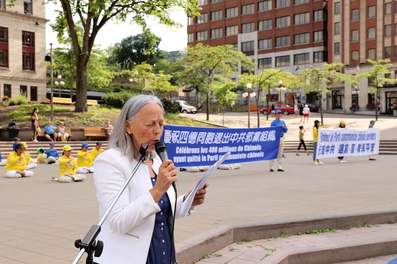 '图2:集会活动协调人法轮功学员米洛(Nicole Milot)女士表示,举办集会是为了庆祝勇敢的4亿中国人退出中共及相关组织,同时让更多的魁北克人、加拿大人认识到共产主义的危害。'