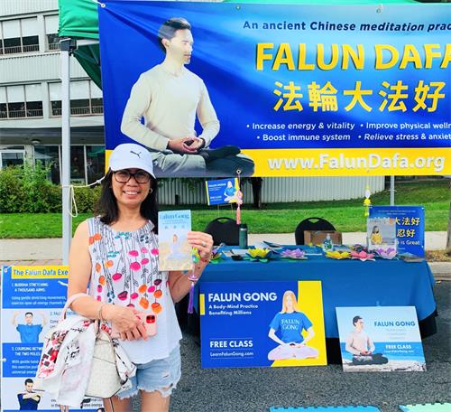 图6:马迪亚(Madia)女士表示自己回去要学炼法轮功。