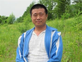'图3:王新春遗照'