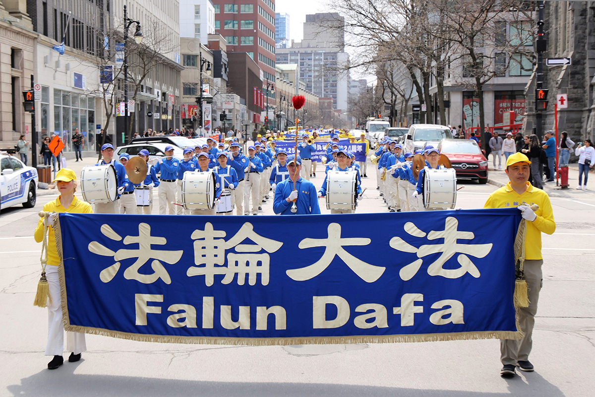 图1:四月二十二日,加拿大魁北克部份法轮功学员在蒙特利尔举行游行集会活动