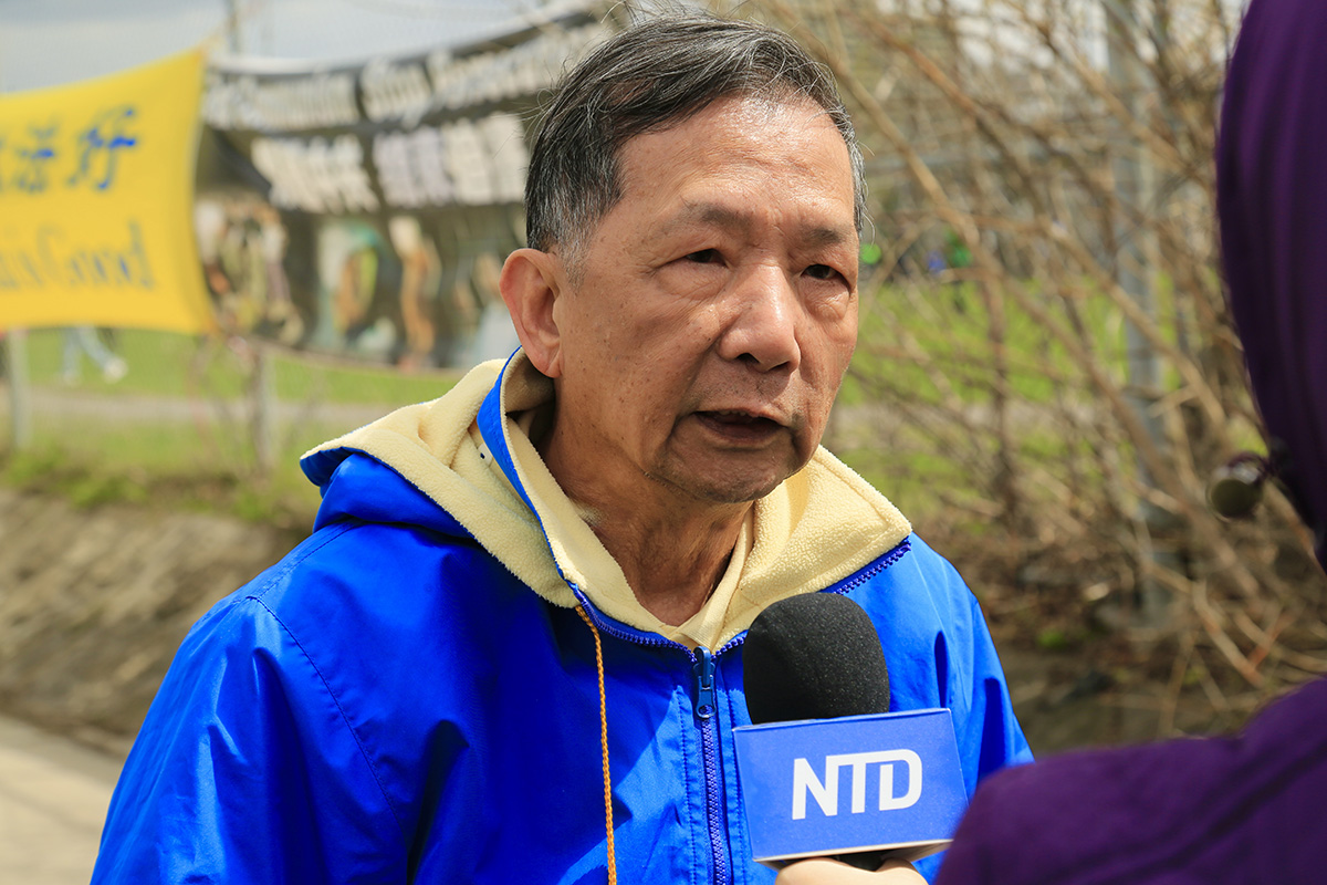 图7:来自台湾的前轮船轮机长陈志洪先生表示,法轮功的和平请愿,对全世界都是有益的。(任侨生/大纪元)