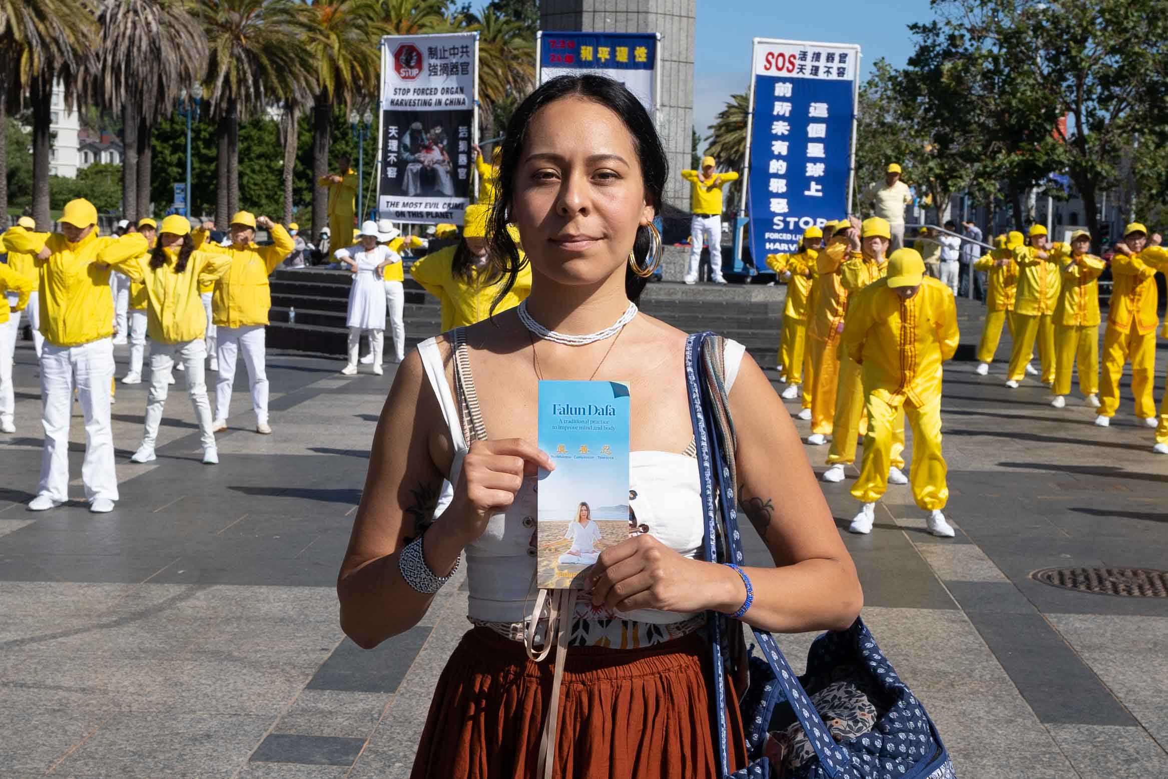 图29:Christine表示,每个人都应该了解真相,支持法轮功。