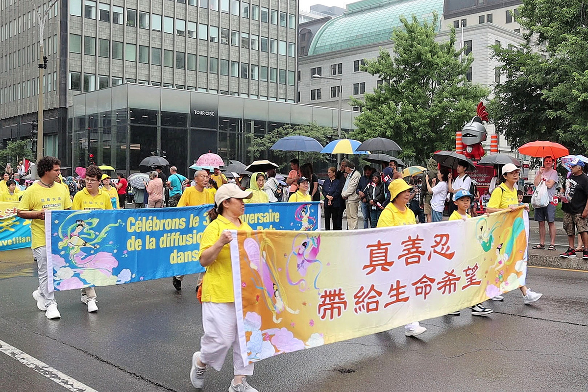 图1~5:二零二三年七月一日,魁北克法轮功学员参加蒙特利尔加拿大日大游行,与民众同庆加拿大一百五十六周年生日。