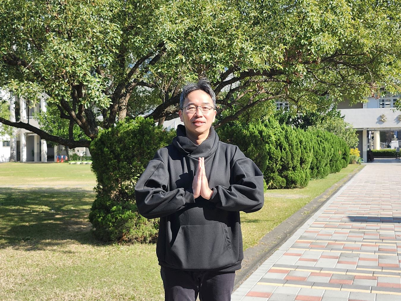 '图2:家住台中的晔蔚恭祝师尊新年好!他认为能学法轮功是非常有福报的。'