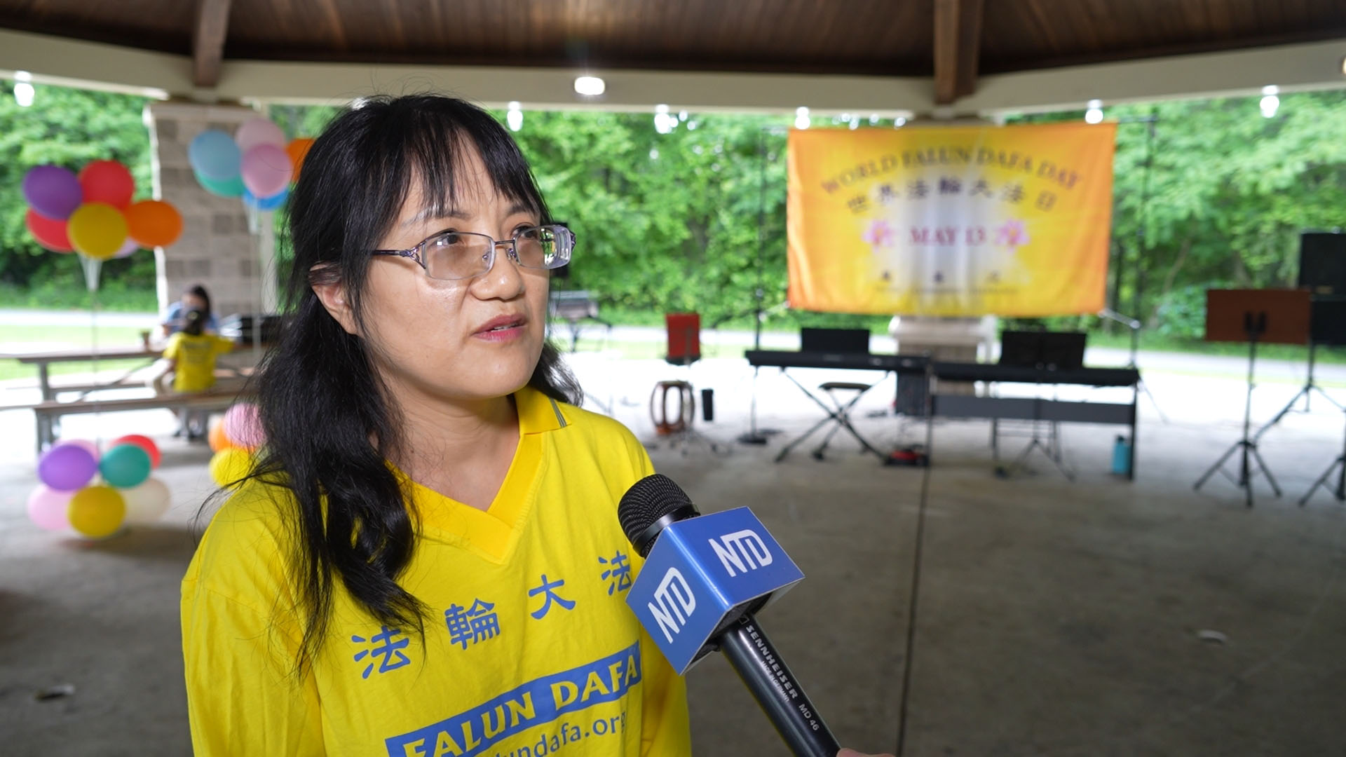 图9:华人学员李女士修炼法轮功已25年。(岳磊/新唐人)