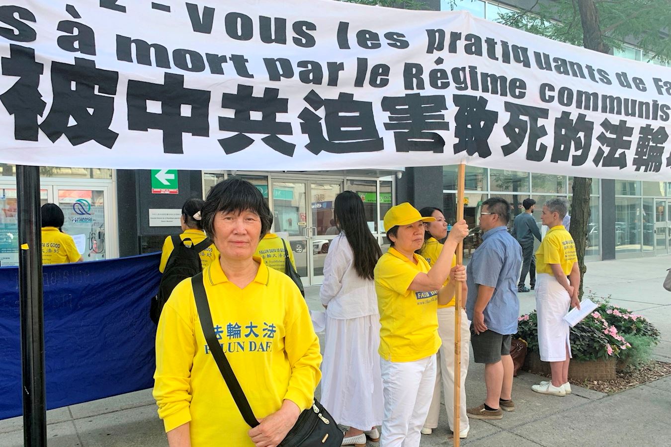 '图5:法轮功学员林女士在集会上'