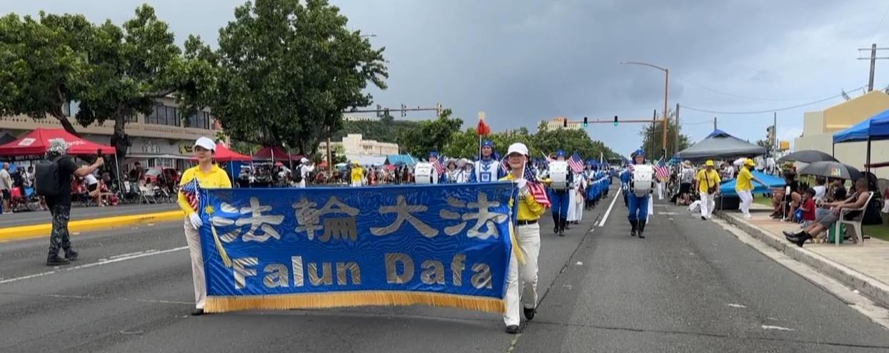 '图1~2:天国乐团参加二零二四年七月二十一日在关岛首都亚加纳的海军陆战队大道(Marine Corps Drive)盛大举行关岛解放八十周年纪念日大游行。'