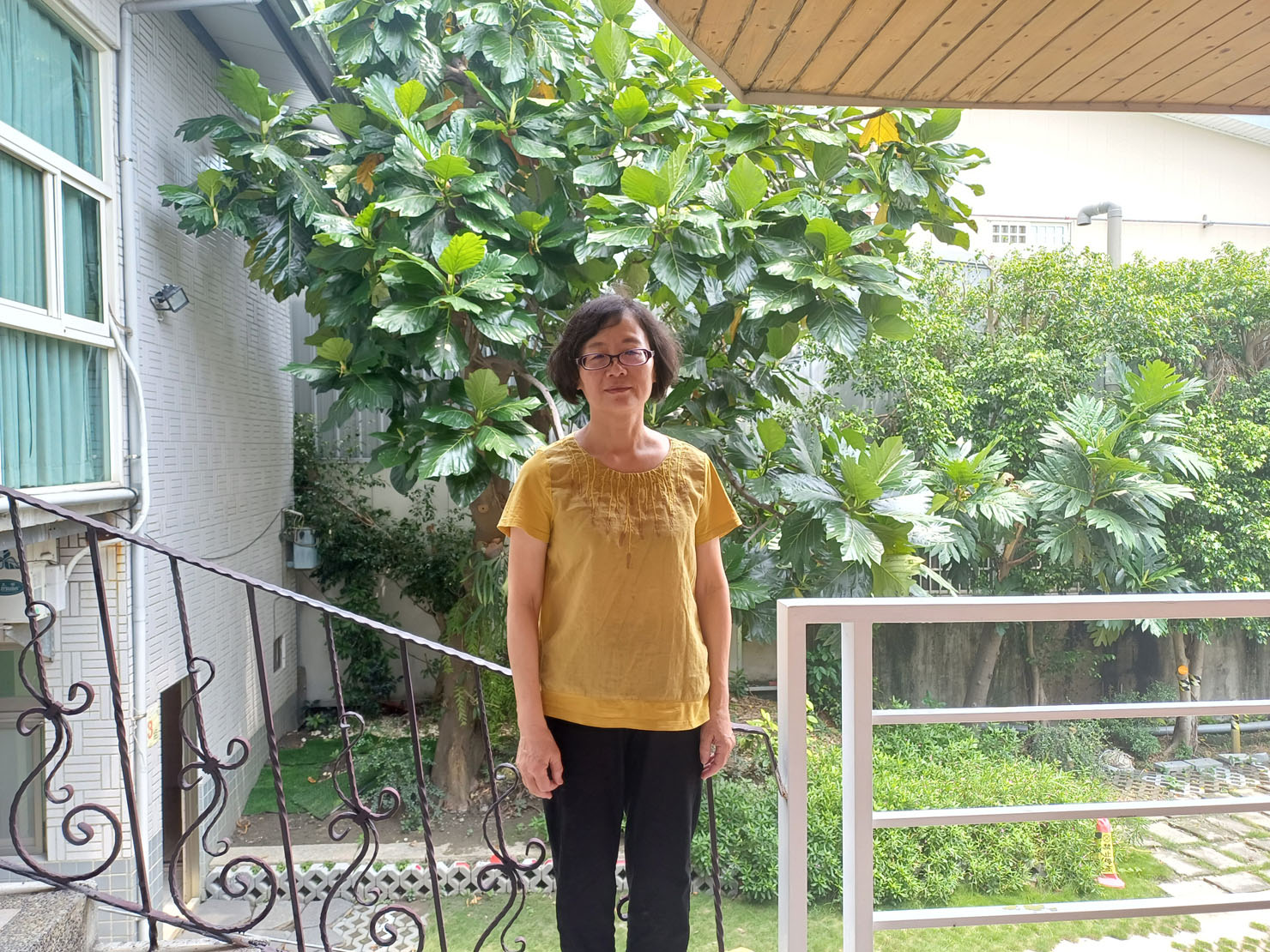 图6:担任炼功点辅导员的桂枝表示,修炼大法让她的家庭重圆。