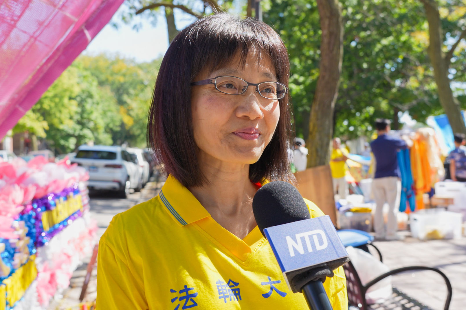 图12:法轮功学员谢女士由衷地感谢法轮大法的师父。