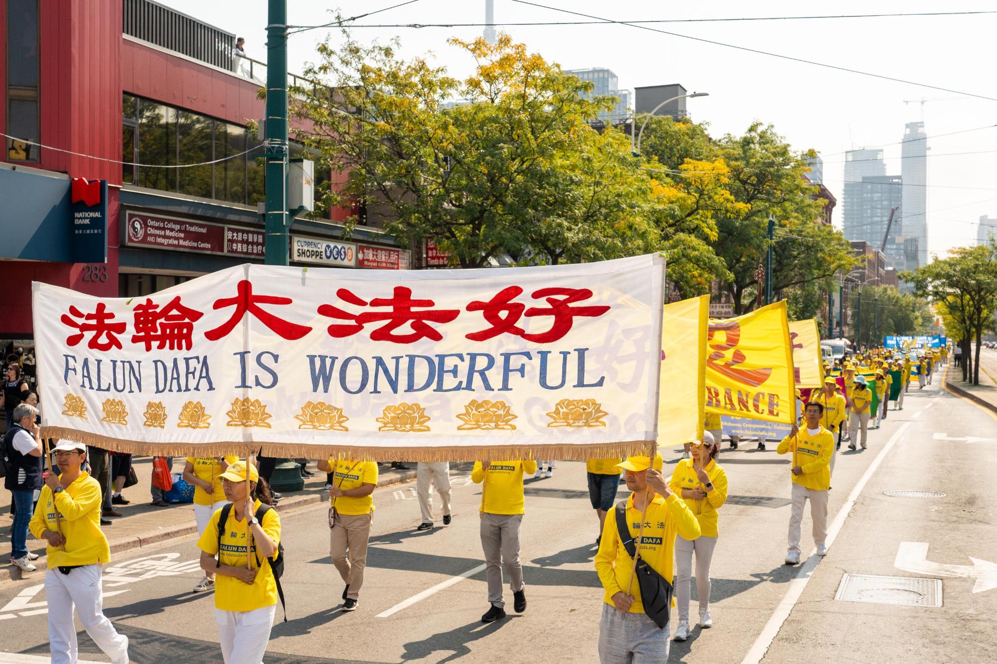 图1~7:二零二四年九月十四日,加拿大多伦多法轮功学员举办主题为“停止中共迫害及声援‘三退’大潮”的游行集会活动。