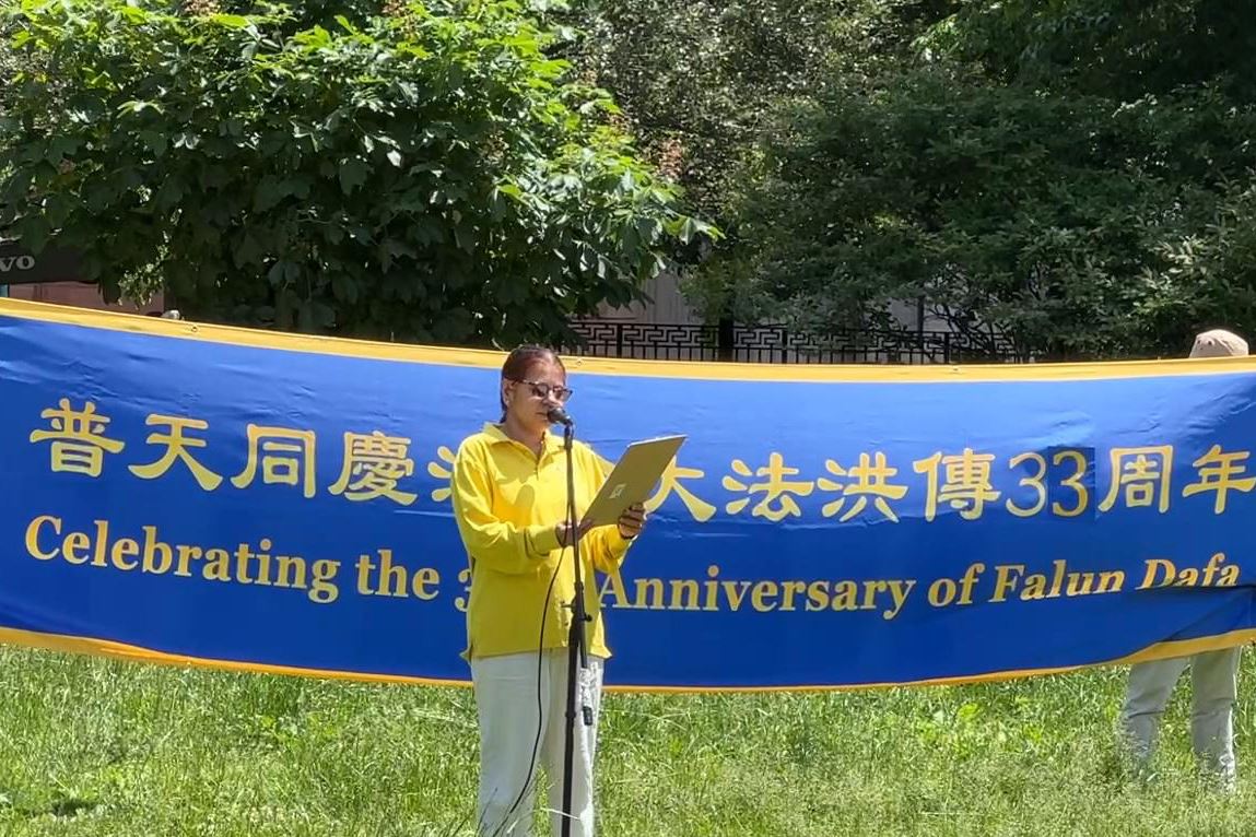 '图9:财富五百强公司副总裁阿努·达玛(Anu Damo)在集会上分享自己修炼法轮功的体会。'