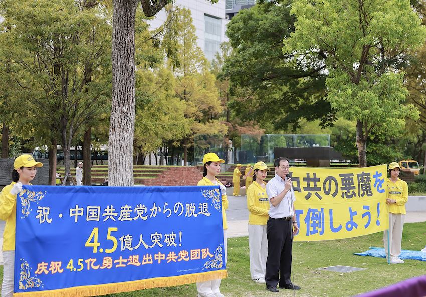 '图7:兵库县芦屋市议会的川上朝荣议员在游行前到场表示支持'