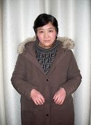 张育珍被关押9年后,于2009年11月9日被释放三个月后的照片